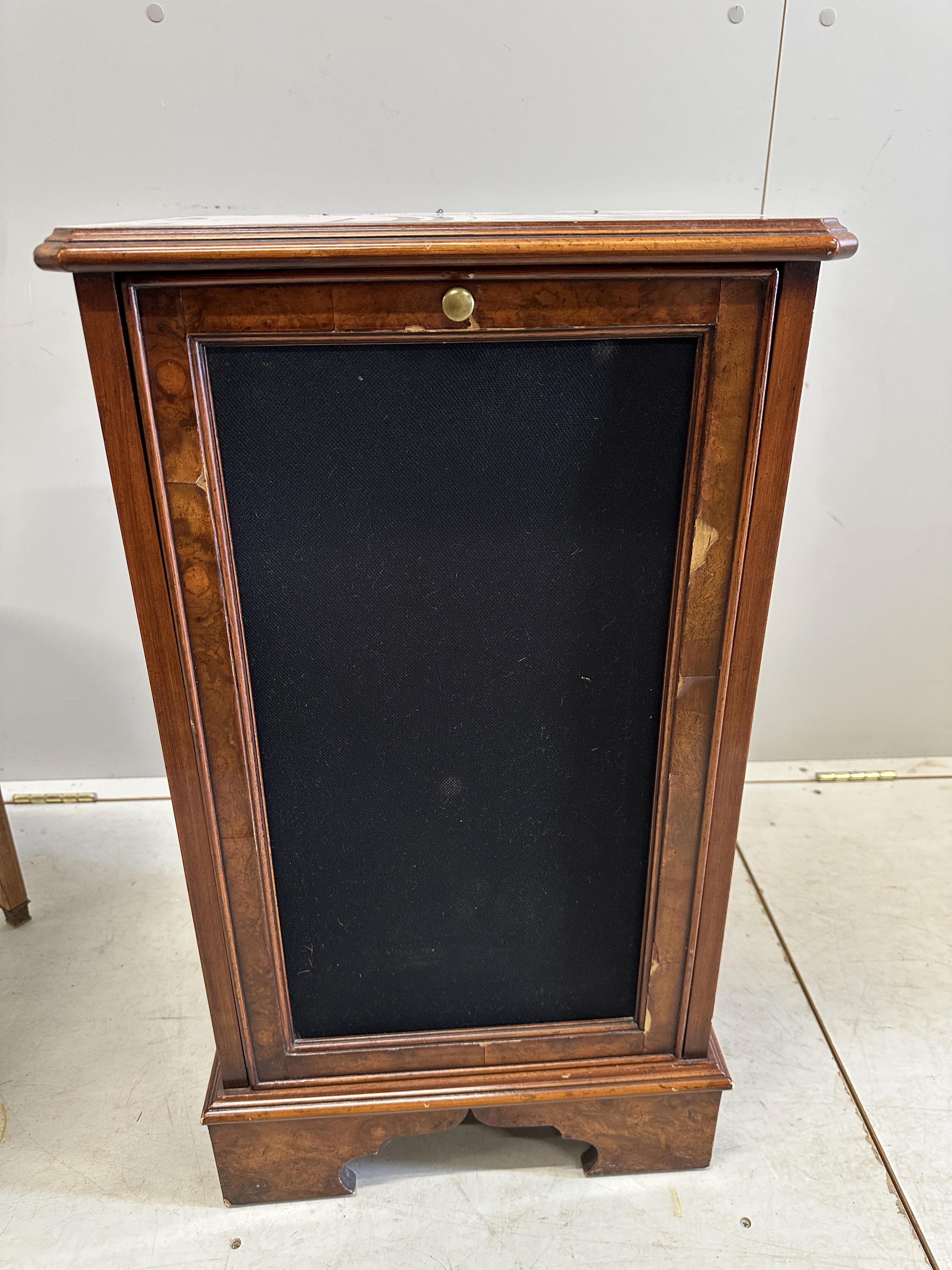 A French Transitional style circular marquetry inlaid coffee table, diameter 59cm, height 46cm together with a walnut speaker cabinet. Condition - poor to fair
